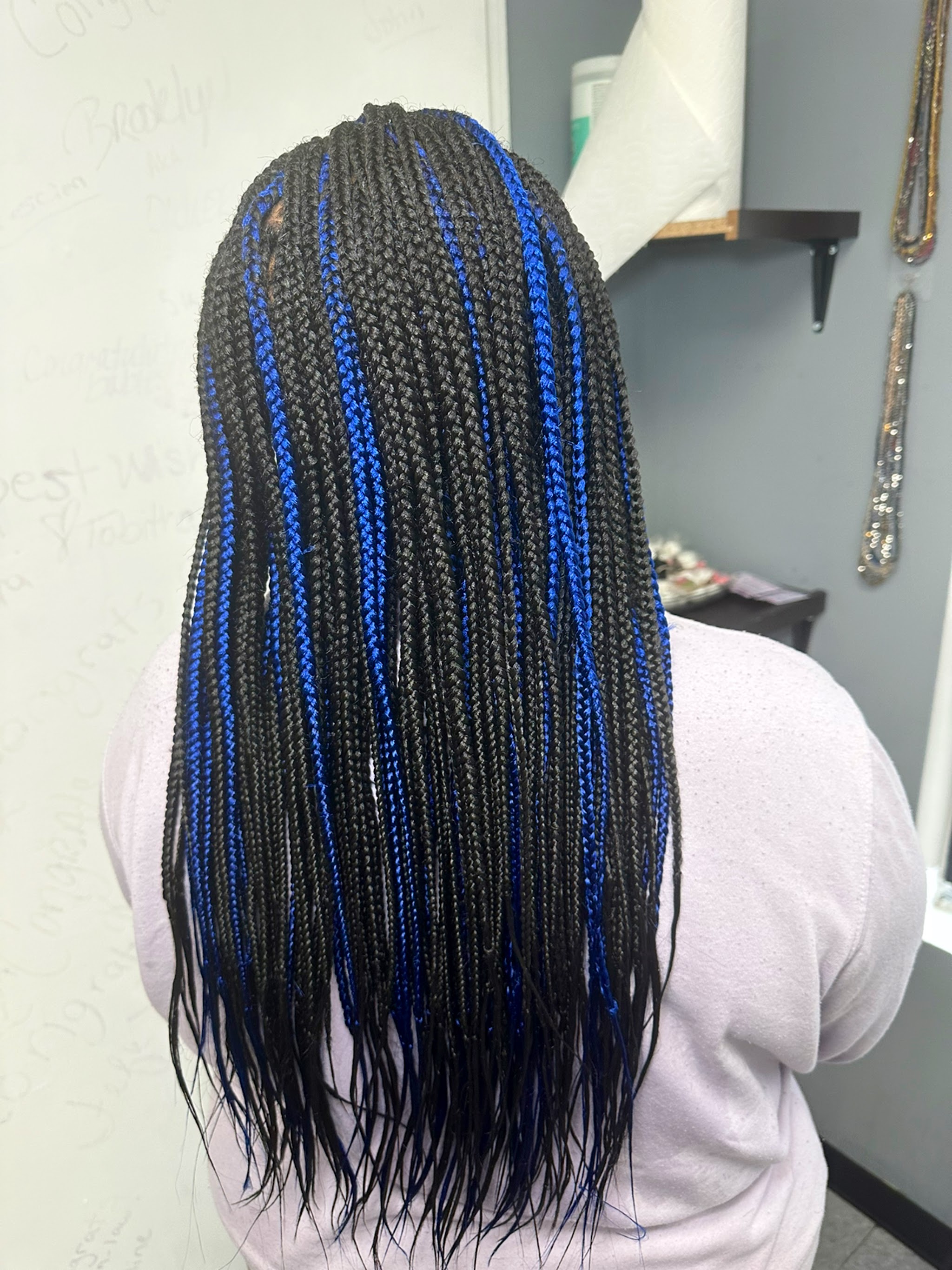 Long box braids with blue highlights