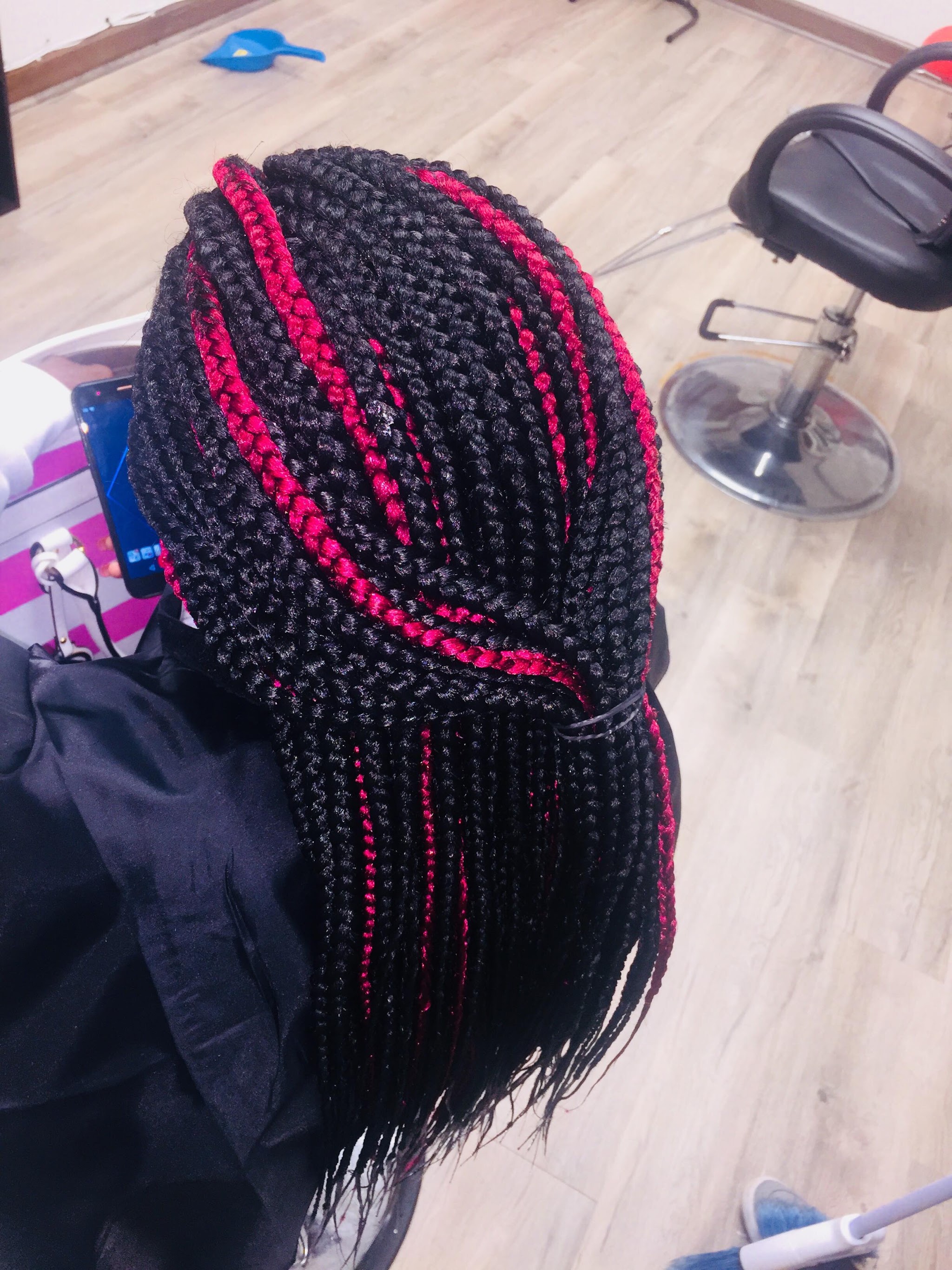 Curly-ended braids with a red-brown tone